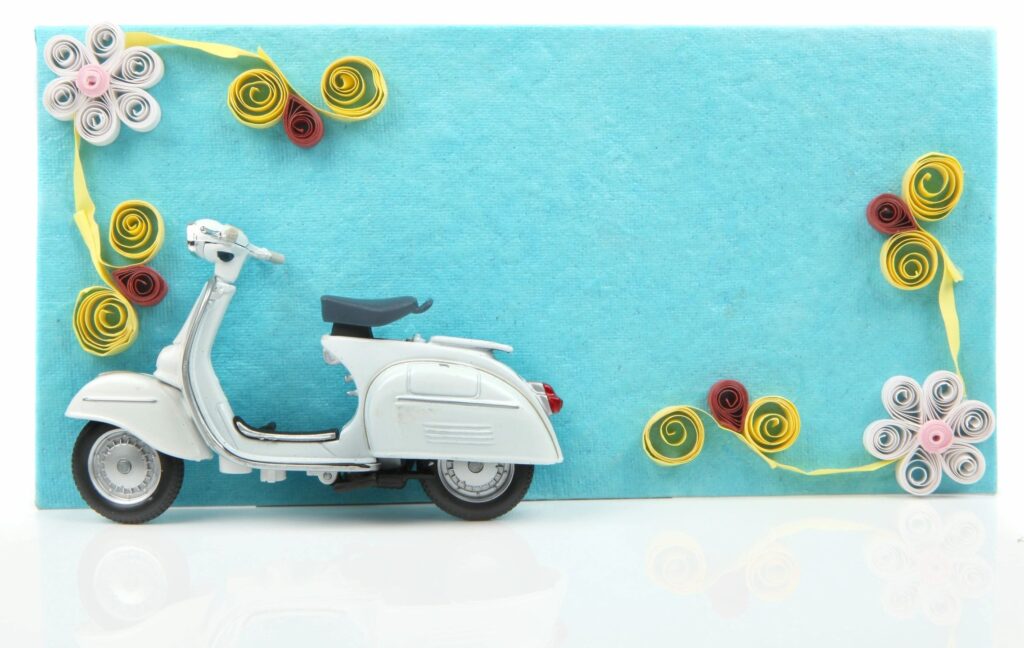 Image of scooter on colorful background